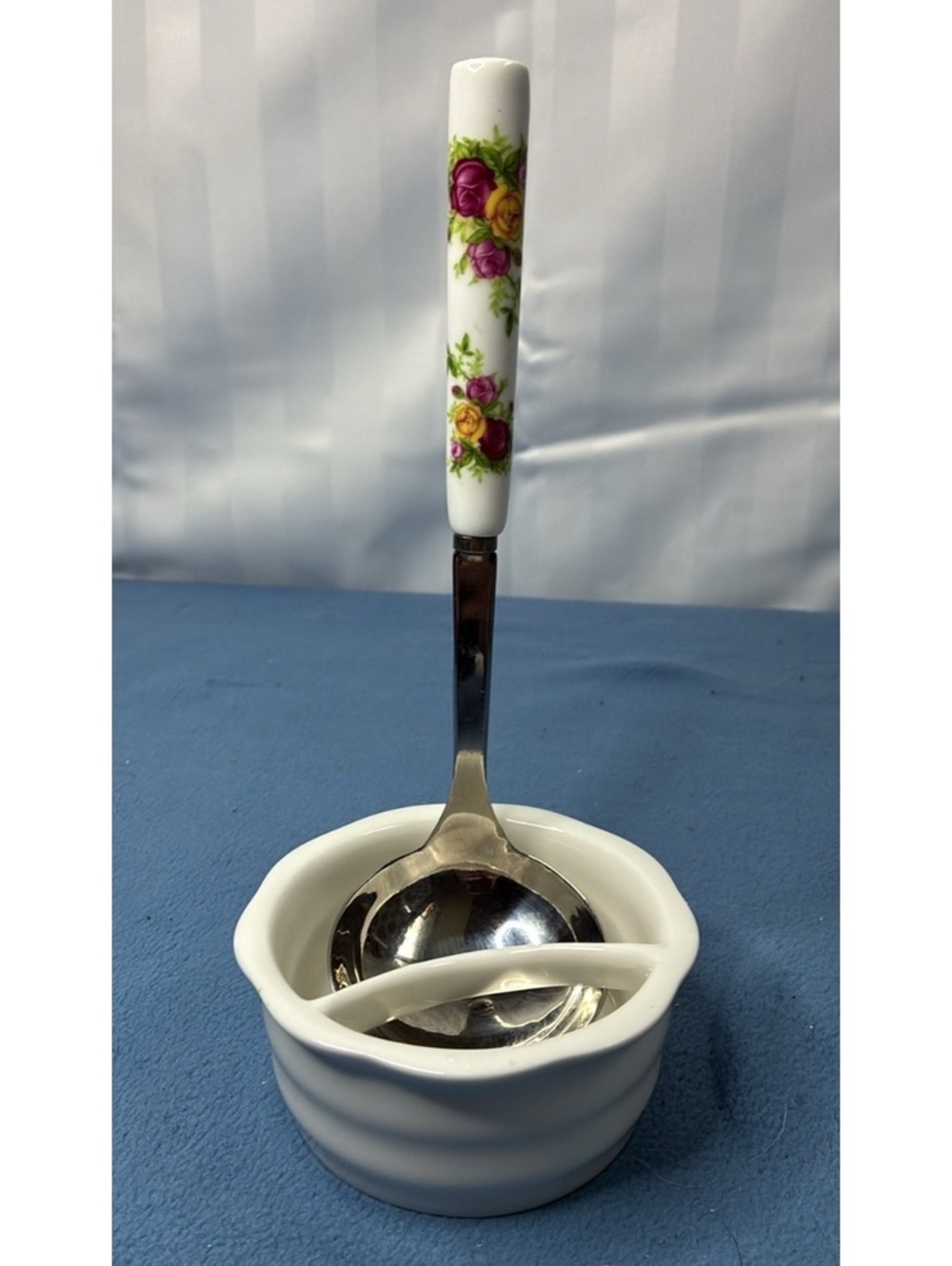 Stainless Steel Ladle with Floral Ceramic Handle and Holder